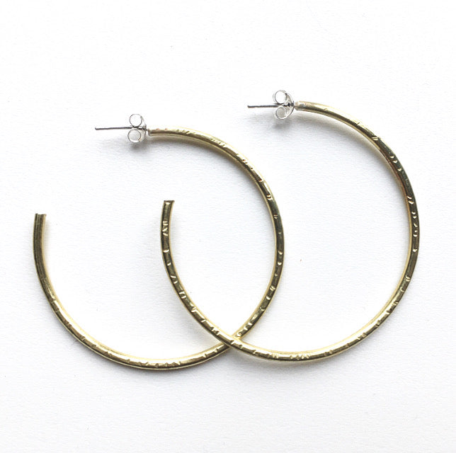 Large hand made hammered gold hoop earrings